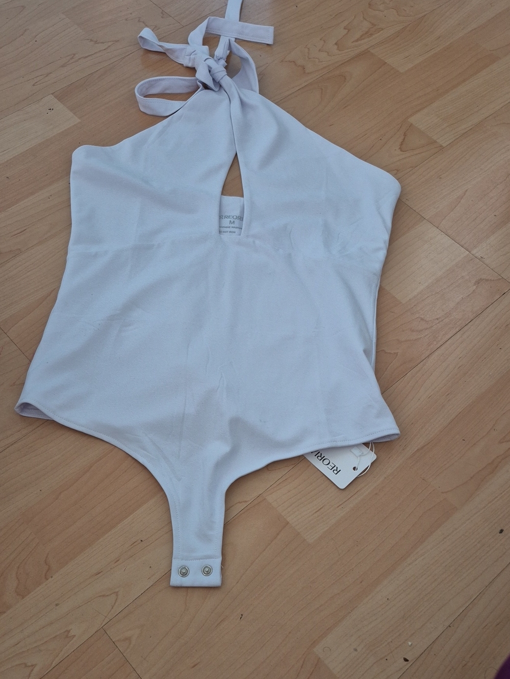 ReoRia White Halter-Style Bodysuit with Keyhole Detail